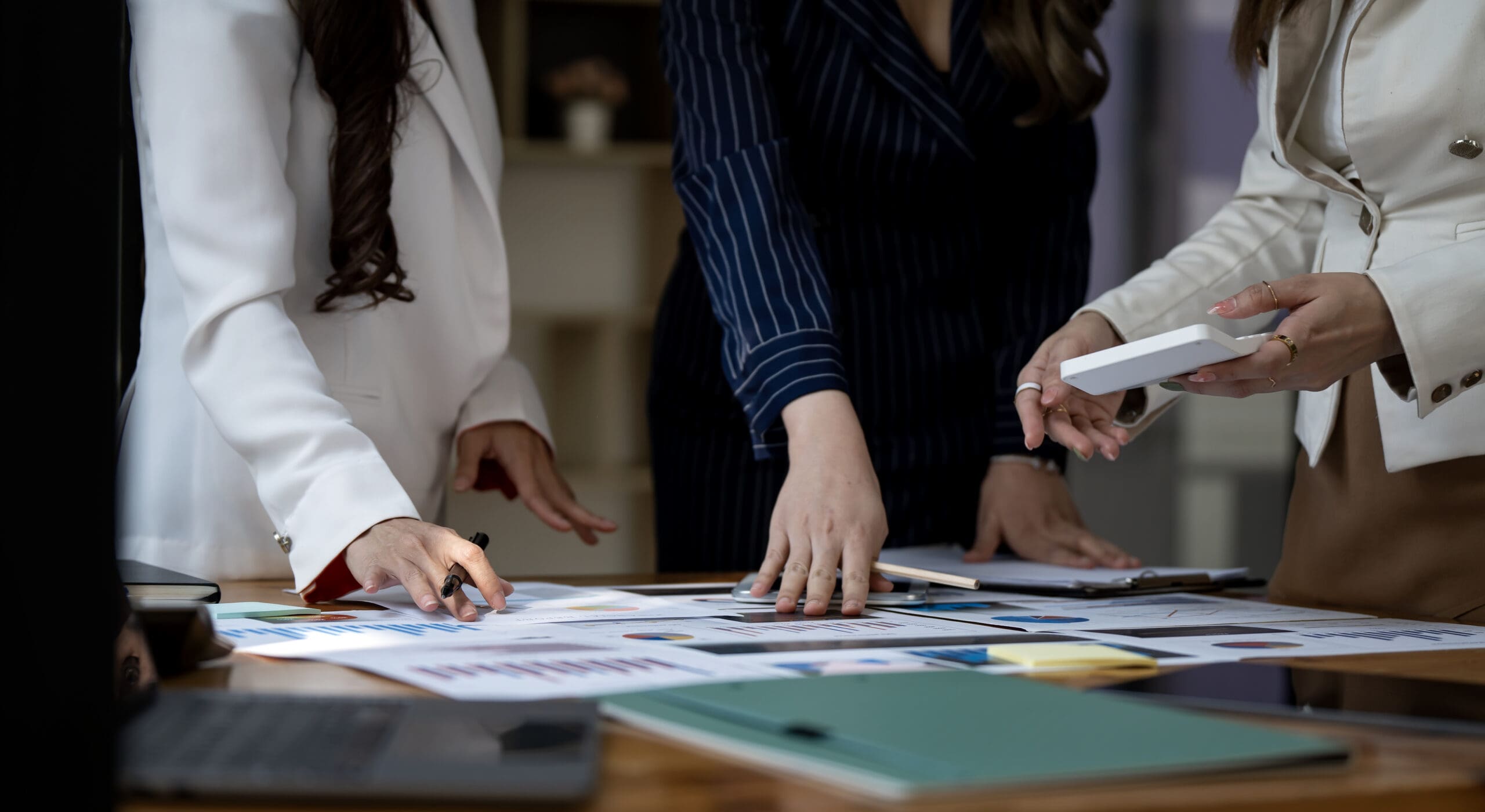 Group of young businesswoman working together. Creative business people in modern office